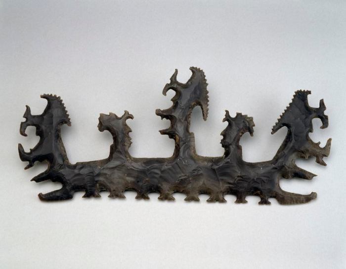 The maya flint depicting a crocodile canoe with passengers 4.4.4